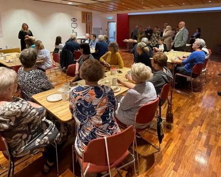 Former employees that have retired came to visit and had morning coffee
